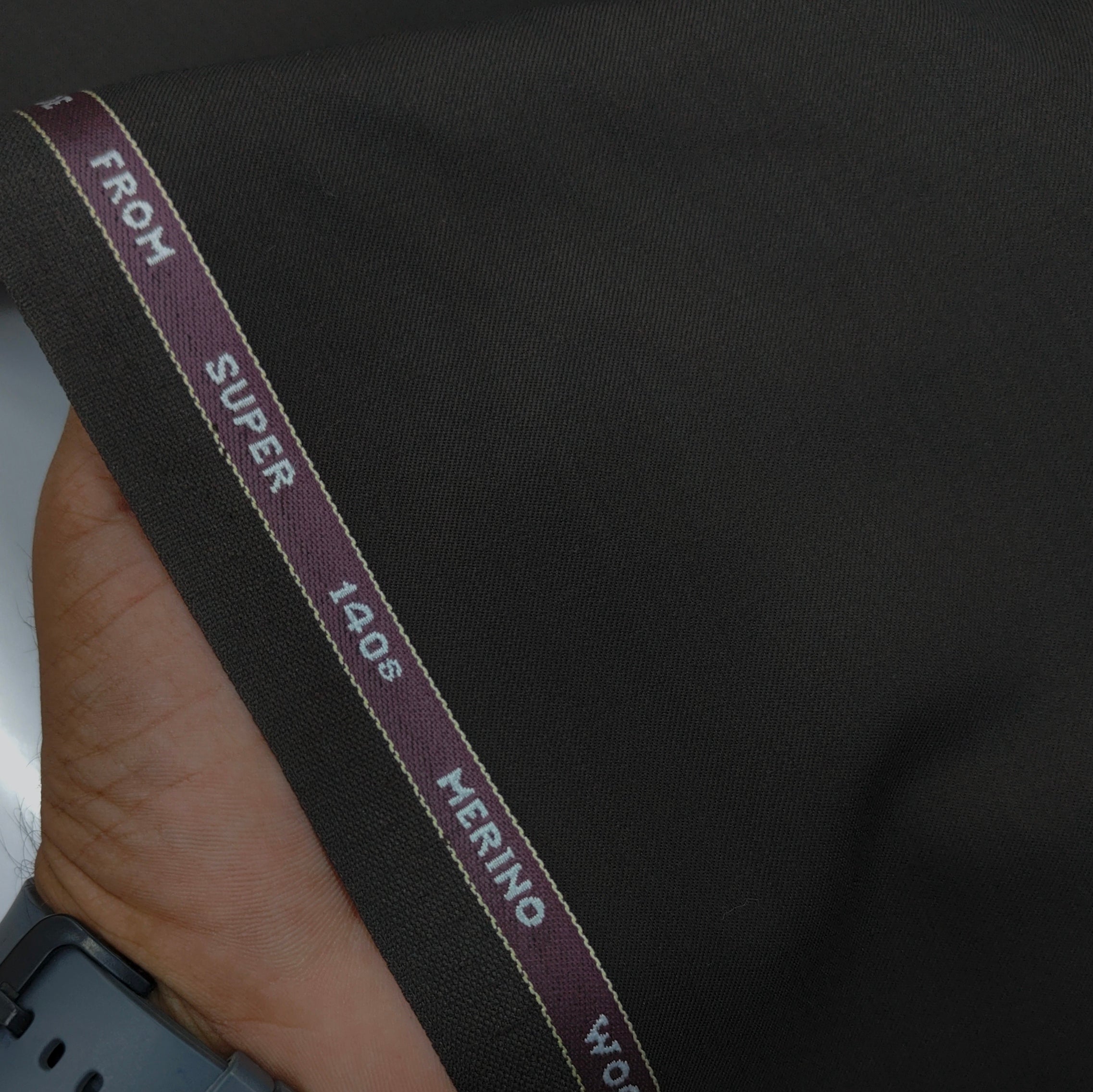 Raymond Exotic Premium Super 140s Count 45% wool Plain Suiting Fabric Colour Dark Bistre Brown